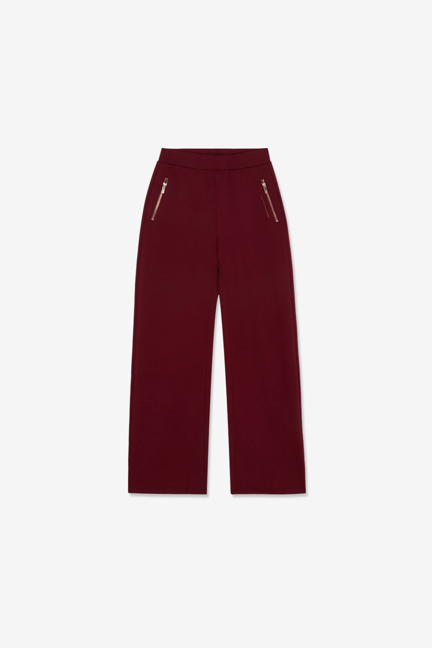 Pantalon Pietra bordeaux large, vue à plat de face.